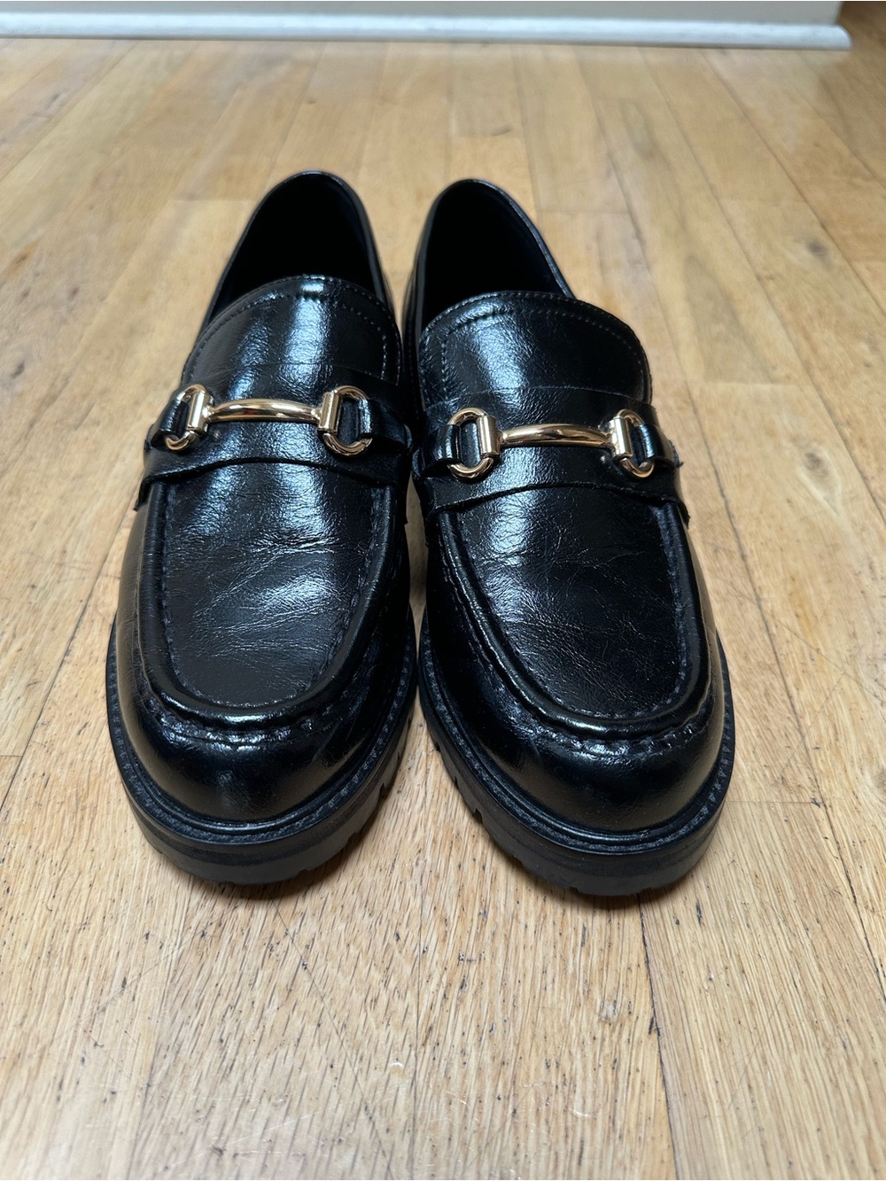 Steve Madden Classic Black Leather Women’s Loafers with Gold Bit Hardware